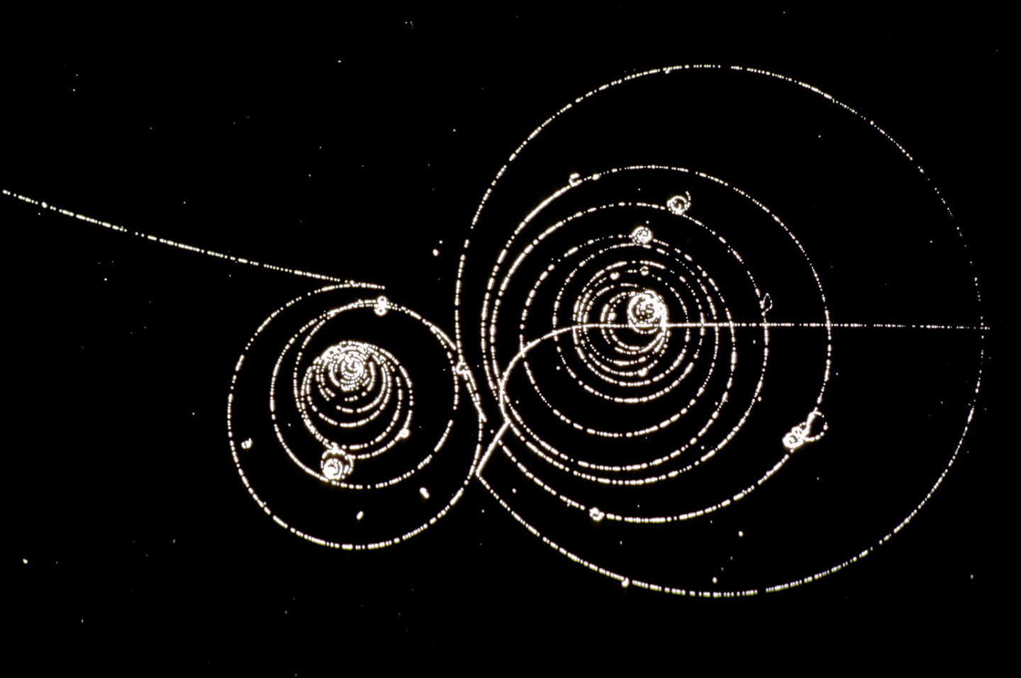 Spiralling particle tracks in a CERN bubble-chamber photograph